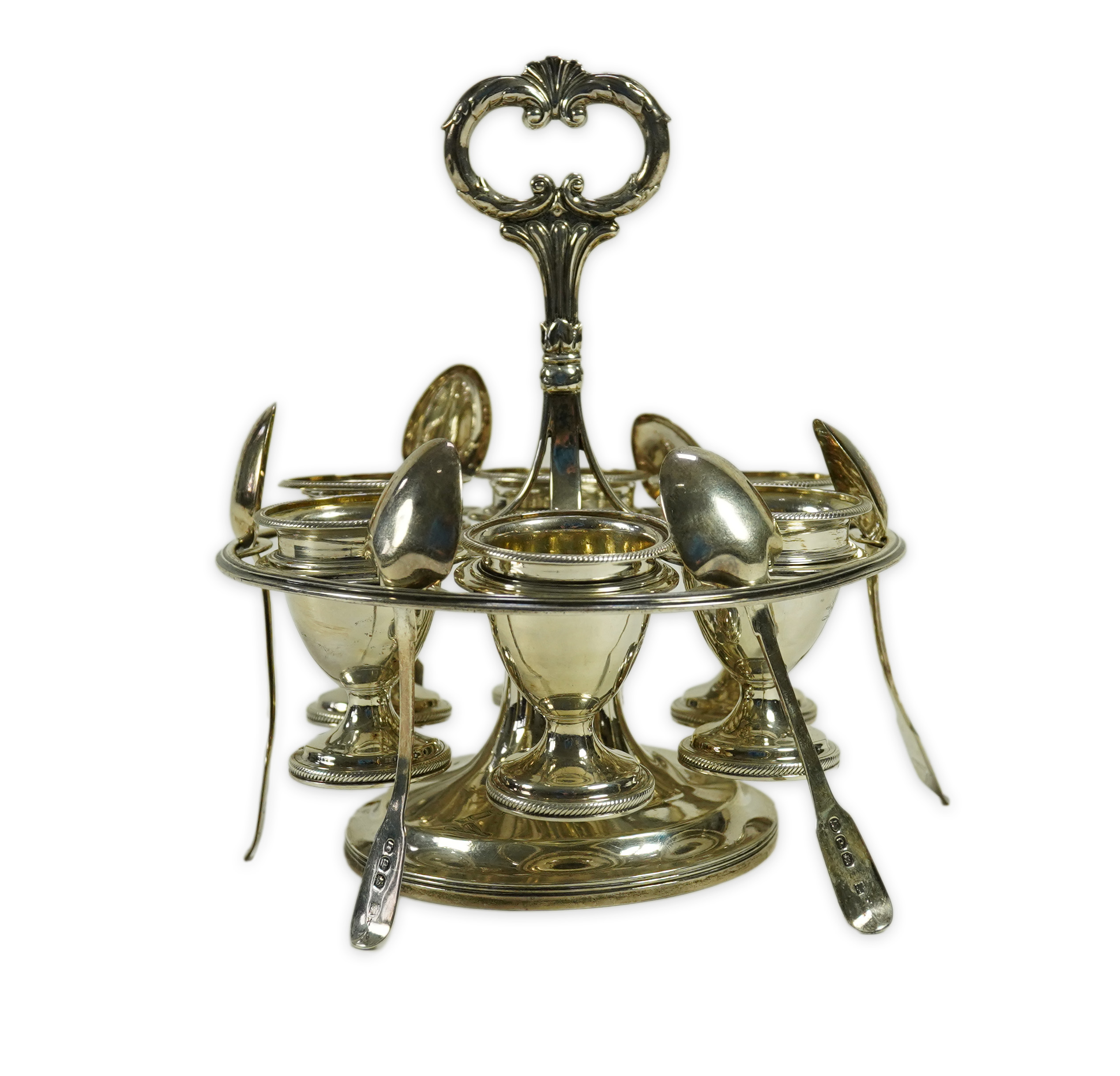 A George III silver egg cruet stand, with six egg cups and six spoons (one not matching), by Solomon Royes & John East Dix